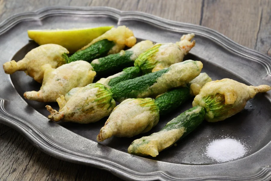 Comment préparer des beignets de fleurs de courgettes ?